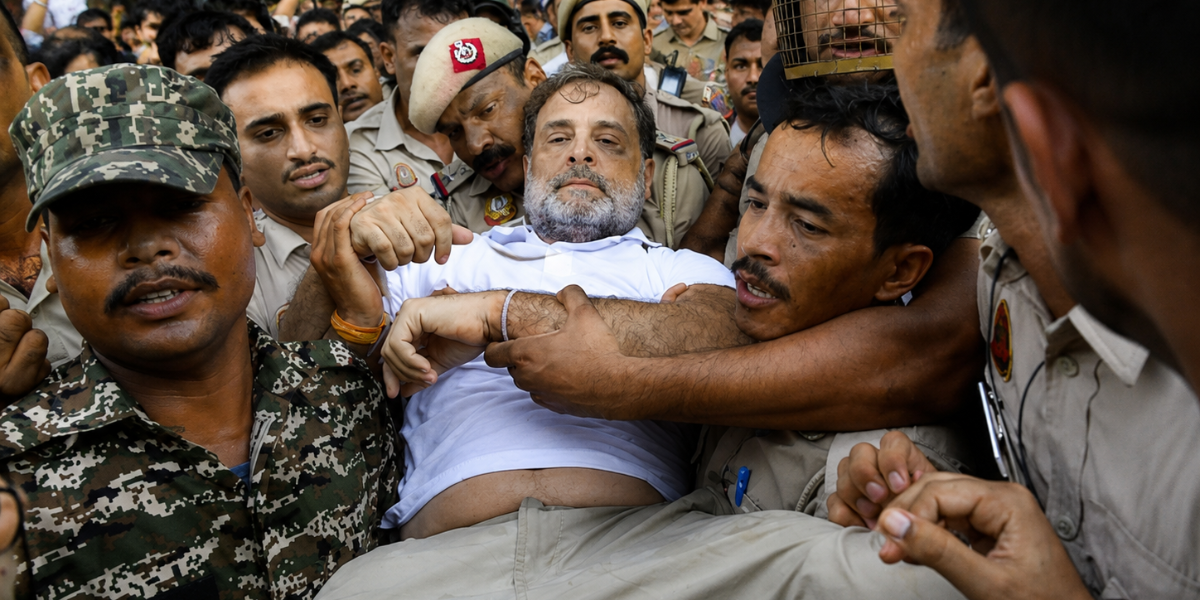 Rahul Gandhi Detained by Delhi Police During Protest Outside Modi's Residence 1 Rahul Gandhi detained by Delhi Police during a protest in New Delhi.